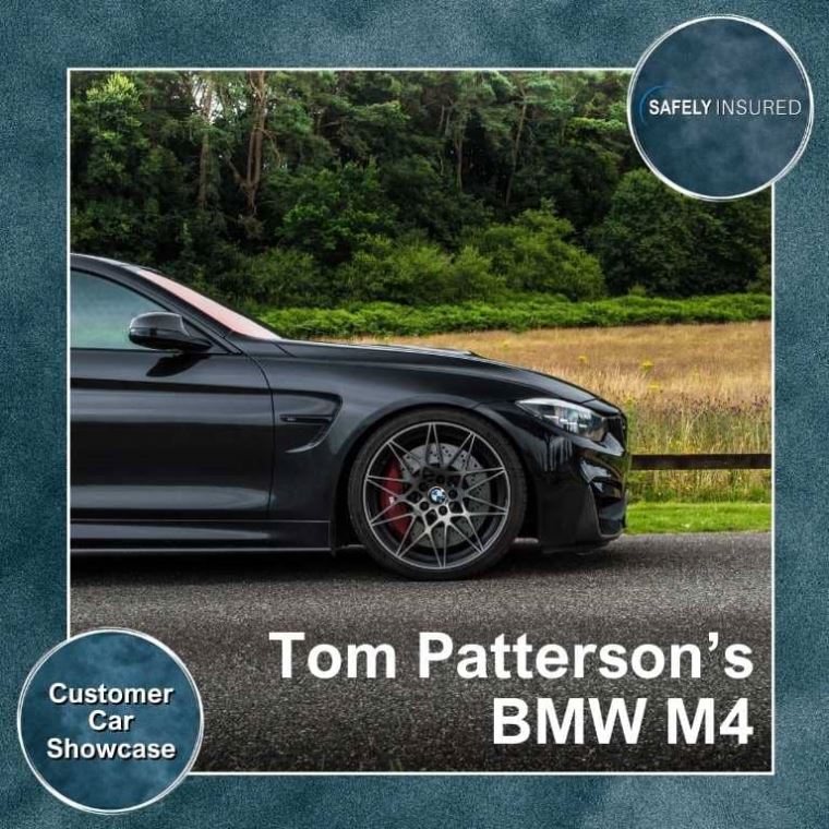 A picture from the side on of a black BMW M4 owned by Tom